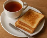 Toast bread with cup of tea